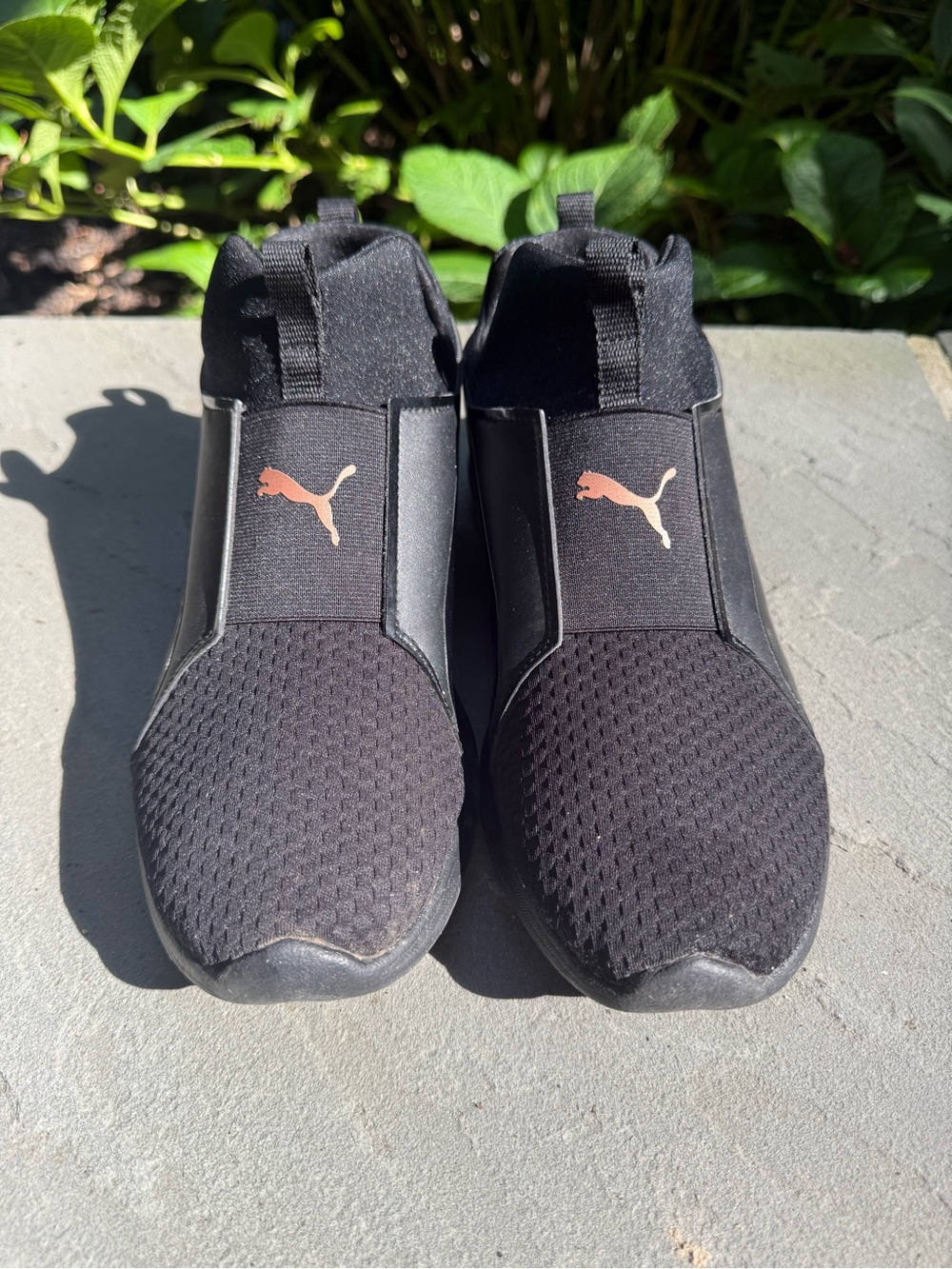 Puma Black Slip-On Sneakers with Gold Puma Logo